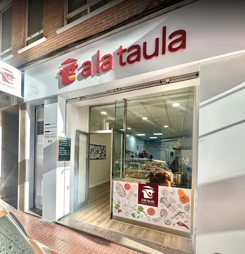 A la taula - Comida para llevar