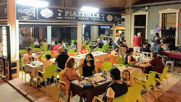 PIAZZOLLA RESTAURANTE -- Tapas, Tapas Gourmet, Pastas, Carnes Pescados pizza Menús Raciones